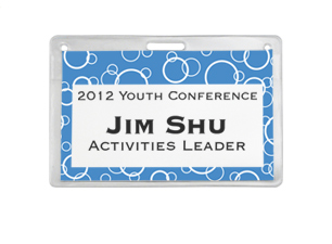 Printed with a blue and white pattern, a cardstock insert inside a badge holder includes a name, job title and an event.