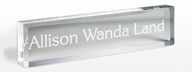 2x8 clear acrylic name plates, engraved on the back.