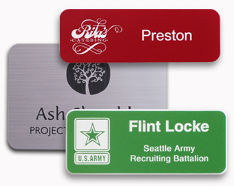 Plastic name tags with an engraved logo.