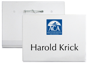 Blue and white logo and a first and last name are printed on a white cardstock insert inside a thin plastic badge holder.