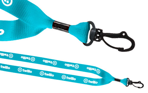 3/4 inch wide turquoise woven polyester lanyard with crimp finish and metal attachment, white silkscreen printing.