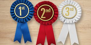 Three stock rosette ribbons that are for first, second and third place.