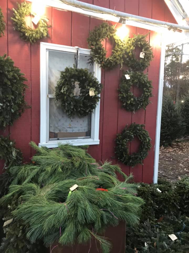 Fresh cut Christmas wreathes from the Wilcox farm with name tags on them